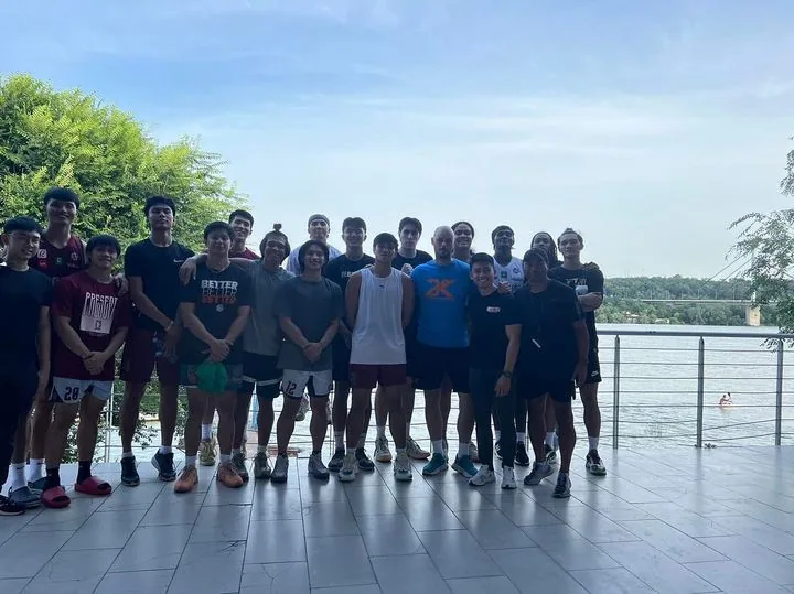 Team photo near the water