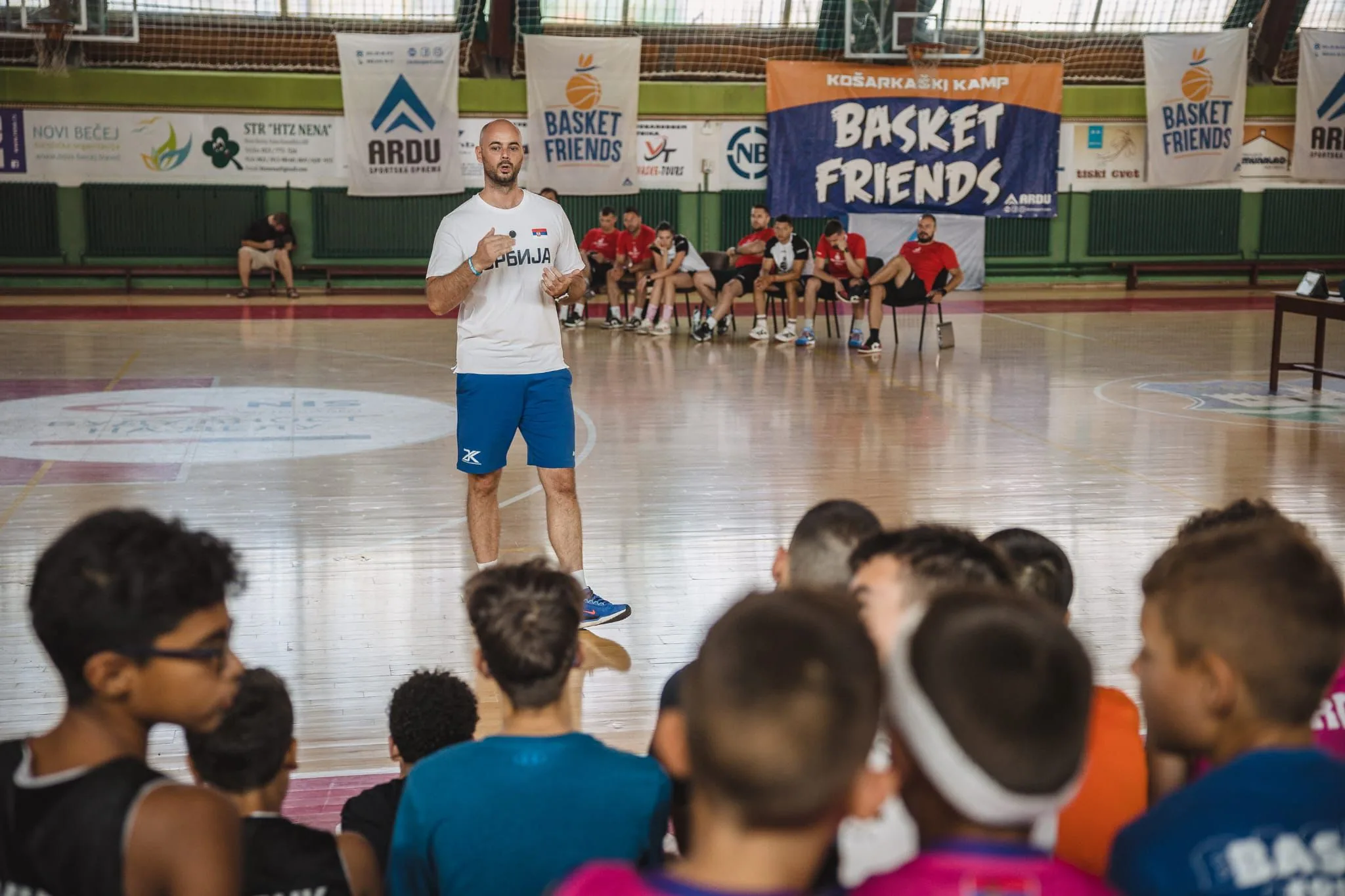 Court coaching session with young athletes