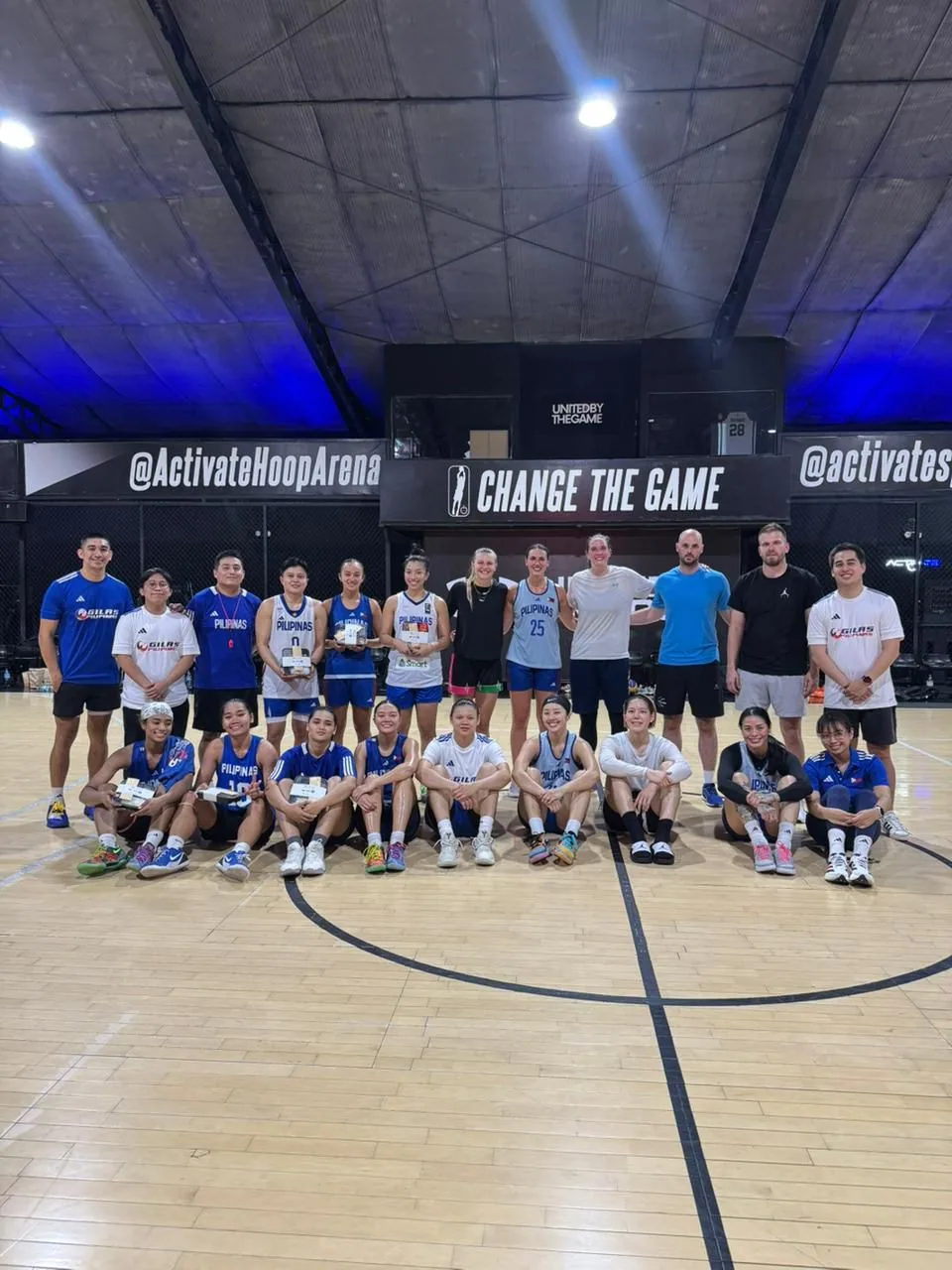 Basketball team on court